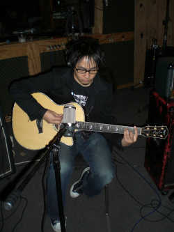 Edison Playing Accoustic